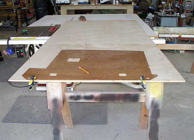 Marking the plywood for cutting