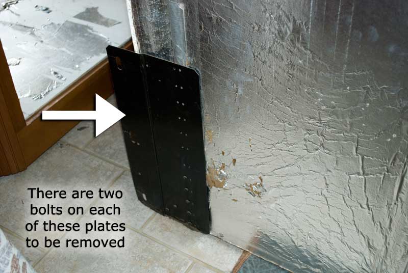 Two bolts to be removed on each side at the rear