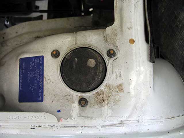 Top of old strut inside the car